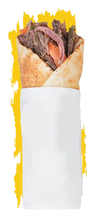 Charcoal-grilled beef shawarma from 961 with parsley, onions, pickles and tahini